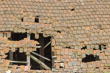 old broken roof (beavertail tiles)