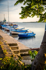 Old boats on Nesebar harbour, Bulgaria. Sunset photo of boats in Black sea