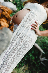 Pictures of the belly of pregnant women in nature with natural background