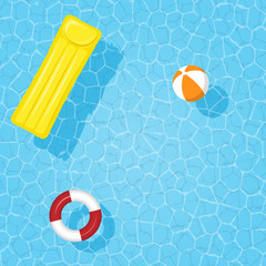 Water in the pool with an inflatable circle, mattress and ball. Place for text.
