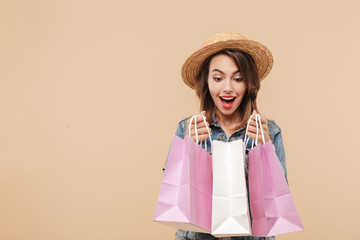 Portrait of a cheerful young girl in summer clothes