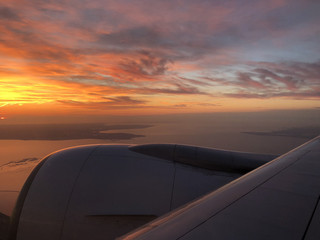 Fototapeta na wymiar Sunset when flying over The Netherlands