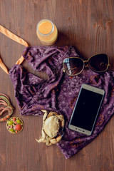 prepare accessories and travel items for summer on white wooden board, flat lay, top view background, the concept of preparation for summer vacation