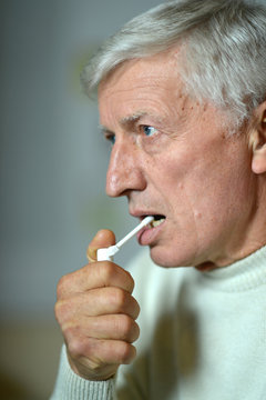 Portrait of a senior ill man