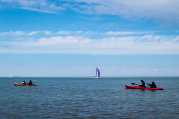 Kayaks and Sailboats