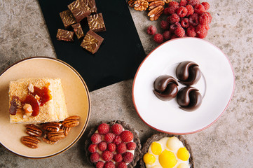 desserts with fruits, mousse, biscuits top view