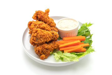fried spicy chicken wings with vegetable