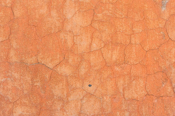 Wall fragment with scratches and cracks