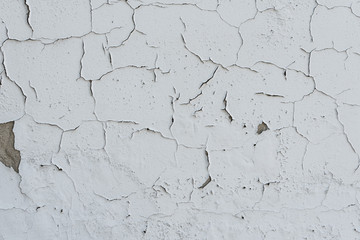 Wall fragment with scratches and cracks