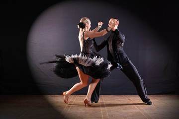 dancers in ballroom isolated on black background