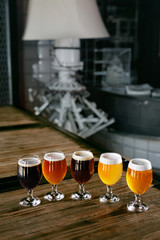 Beer Glasses On Wooden Table Closeup