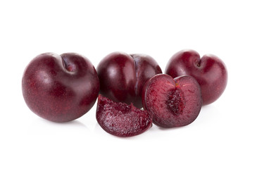 plums isolated on white