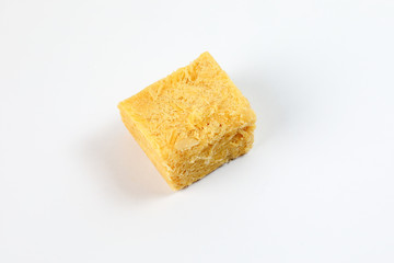Flaky sweet Soan papdi  patisa son papri sohan papdi shonpapri on white background
