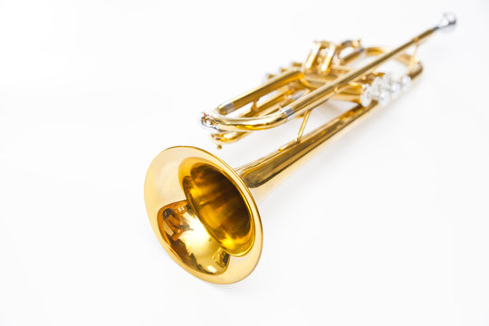 gold trumpet on white background