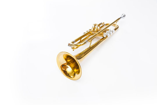 gold trumpet on white background