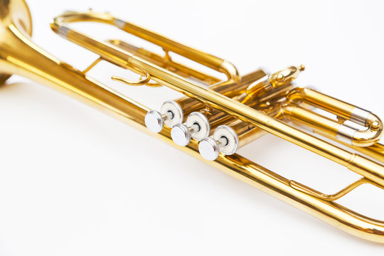 gold trumpet on white background