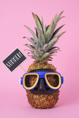 pineapple with a diving mask and word summer