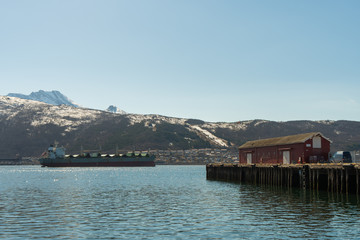 Fototapeta na wymiar A cargo ship at the port of Narvik, Norway