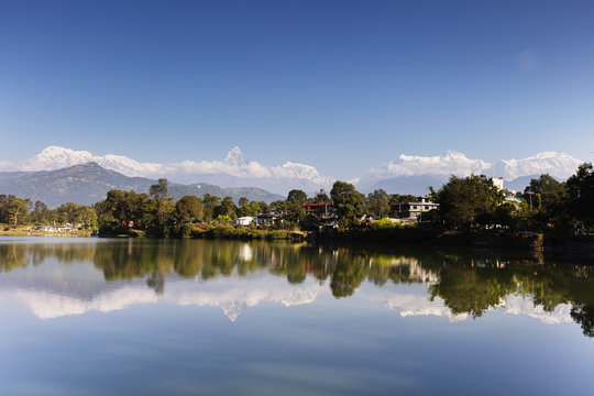 Reflection of Annapurna 8000m mountain range and Machapuchare (Fishtail mountain) 6993m, Pokara, Nepal, Himalayas