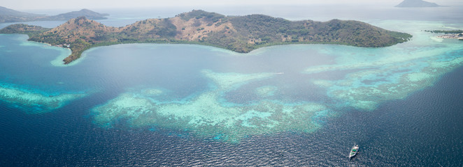 Aerial View of Amazing Coral Reef and Remote Island in Indonesia