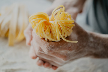 Chef making traditional italian homemade pasta