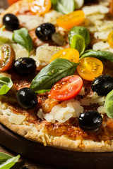 Traditional italian pizza on wooden table
