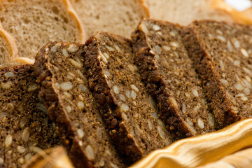 A Variety Of Freshly Baked Bread In A Wicker Basket