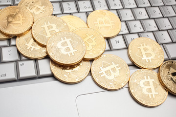 bitcoins on keyboard