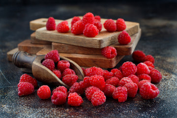 Fresh raspberries on a dark background