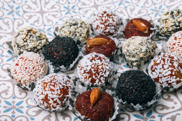 sweets from dried fruits with nuts and sesame seeds