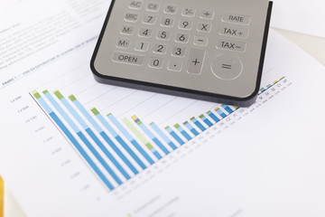 Naklejka na ściany i meble Business analysis - accounting report with calculator