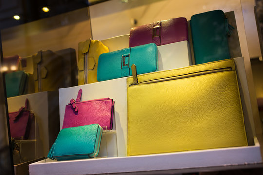 Women's handbags in the shop window close-up