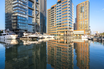 modern office building with boat in pier