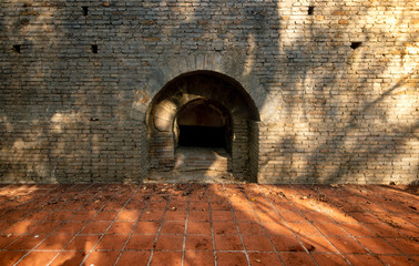 Old brick tunnel. Prisoner imprisoned prisoner.