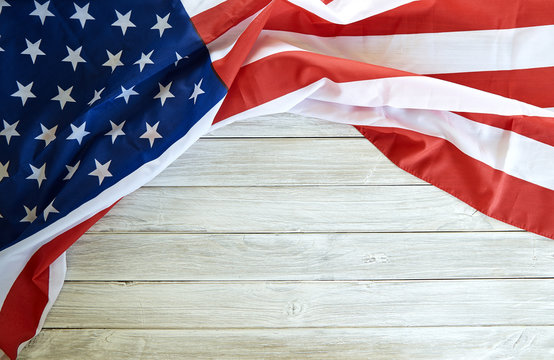 Flag of the USA on wooden background