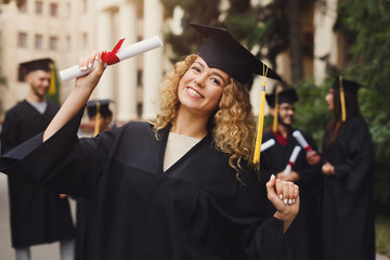 Happy young woman on her graduation day