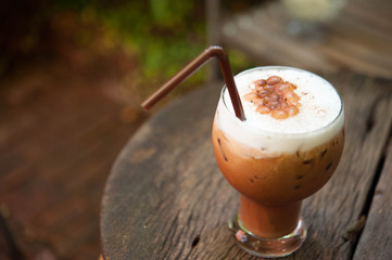 Ice coffee Mocha put on a wooden table with relax time