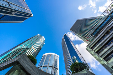 Fototapeta na wymiar up view of modern office building in hongkong china