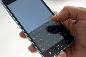 smart phon and hand  touch on keypad