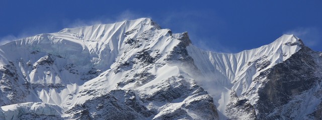 Mountain ridge of the Langtang Himal range covered by snow and glacier.