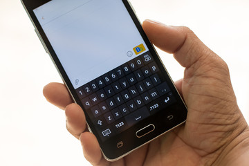 smart phon and hand  touch on keypad