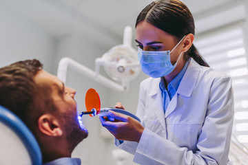 dentist making dental procedure