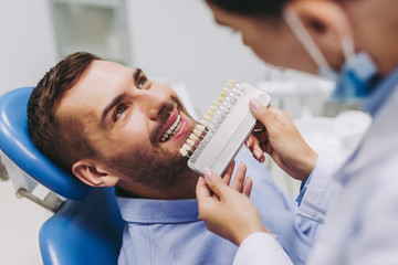 patient choosing tooth implants