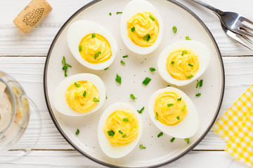 Stuffed eggs, yellow mousse, wine snack, holiday party