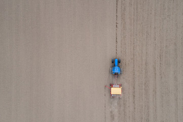 Farm machinery on the field. Agricultural landscape from the air