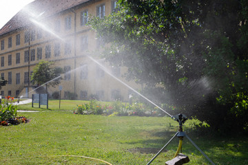 spinkle equipment on a green lawn
