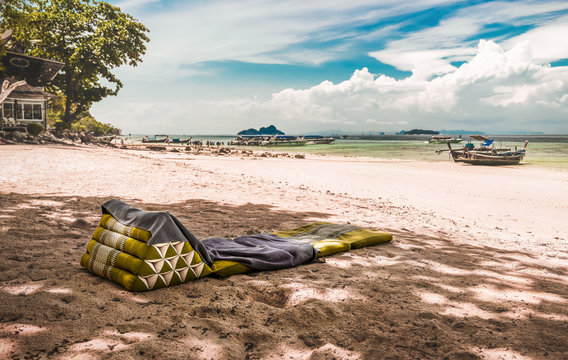 Green Beach Chair With Towel In The Sand Of Koh Phi Phi Island, Thailand