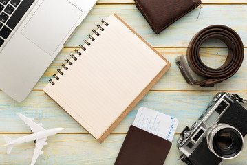 Summer holiday background, Travel and vacation items on wooden table. Top view