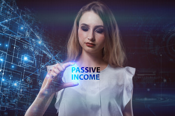 The concept of business, technology, the Internet and the network. A young entrepreneur working on a virtual screen of the future and sees the inscription: Passive income