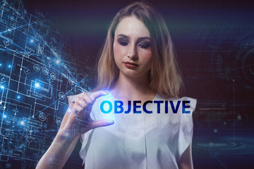 The concept of business, technology, the Internet and the network. A young entrepreneur working on a virtual screen of the future and sees the inscription: Objective